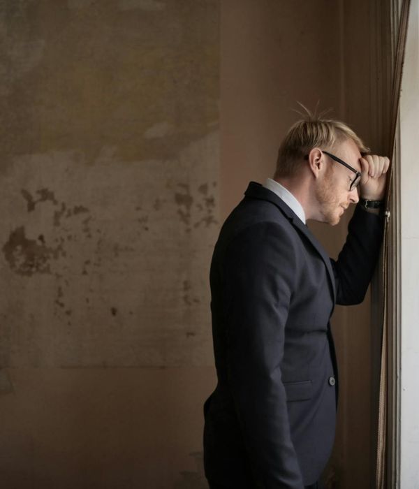 Man financial educator in formal business suit